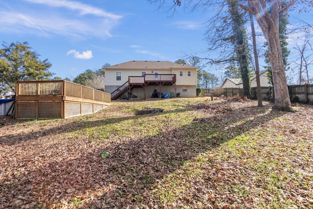 rear view of property with a deck