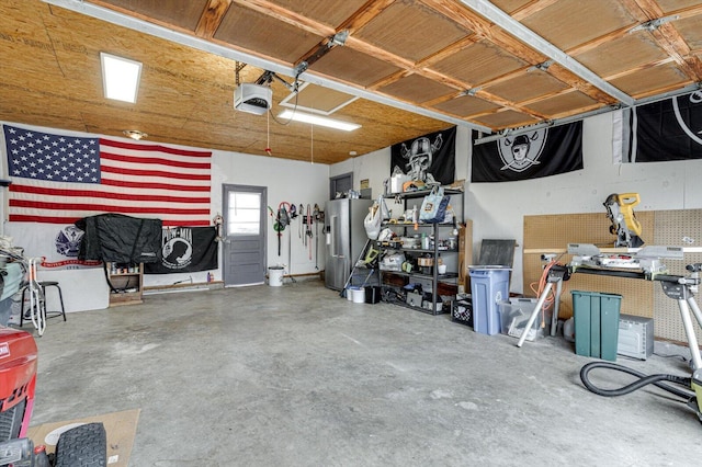 garage featuring a garage door opener, high quality fridge, and a workshop area