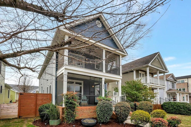 view of front of home featuring a sunroom