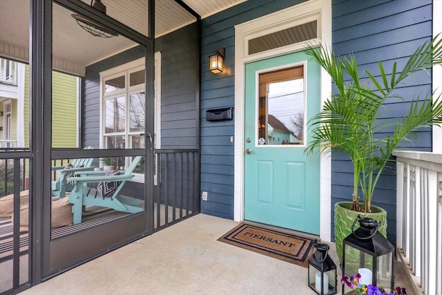 entrance to property with covered porch