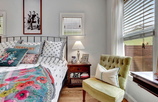 bedroom with light hardwood / wood-style floors