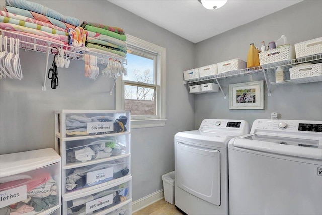 laundry area with independent washer and dryer