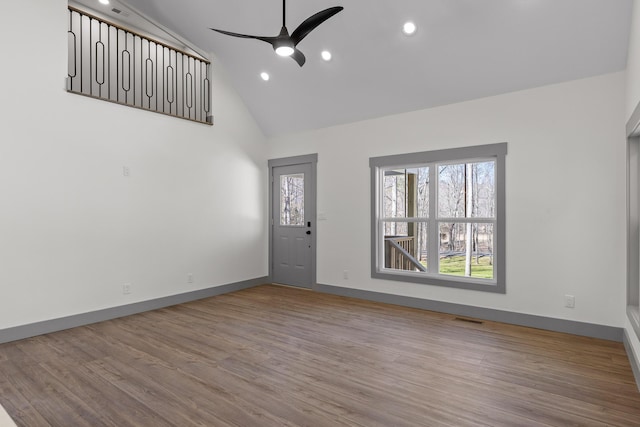 interior space featuring baseboards, visible vents, a ceiling fan, wood finished floors, and recessed lighting