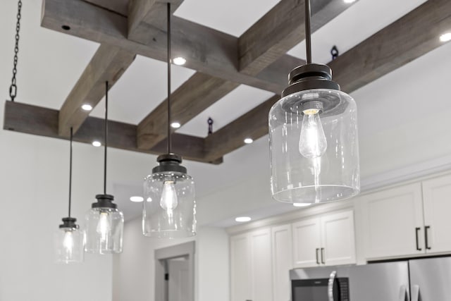 room details with beamed ceiling and white cabinets