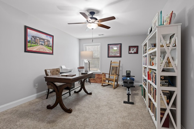 office area featuring ceiling fan and carpet