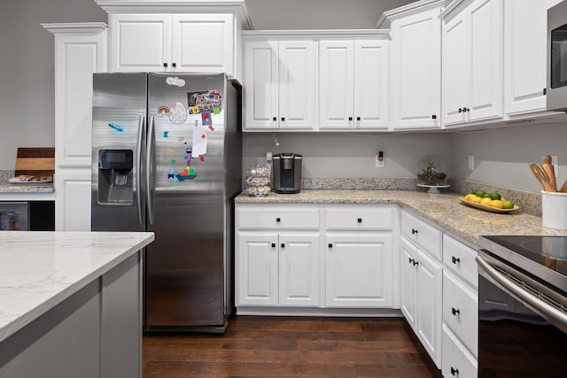 kitchen with white cabinetry, light stone countertops, dark wood-type flooring, and stainless steel appliances