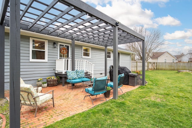 view of patio / terrace featuring area for grilling and a pergola