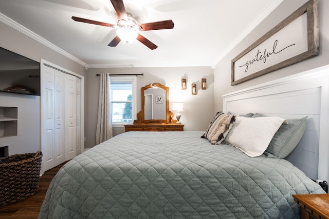 bedroom featuring crown molding, ceiling fan, dark hardwood / wood-style flooring, and a closet