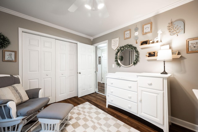 sitting room featuring ornamental molding, ceiling fan, and dark hardwood / wood-style flooring