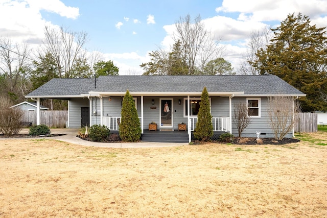 single story home featuring covered porch and a front lawn