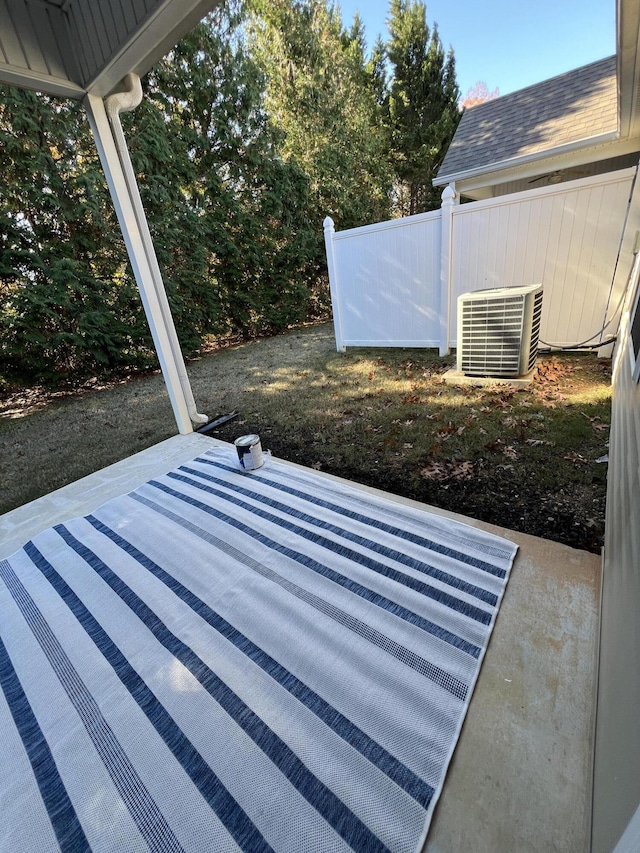 view of patio with central AC unit