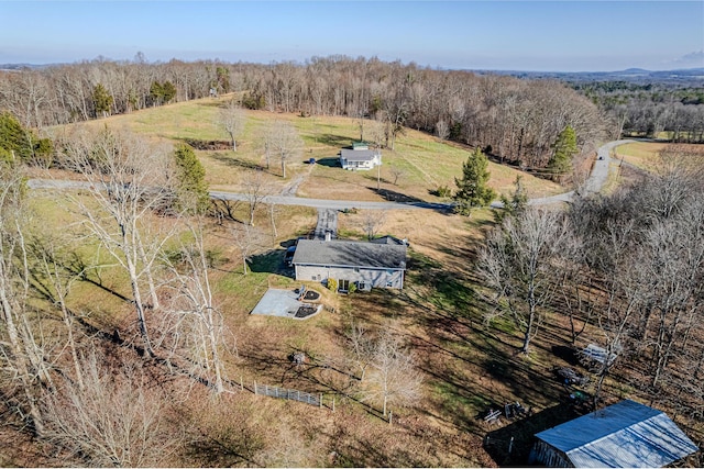 birds eye view of property featuring a rural view