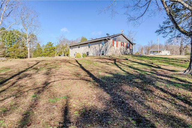 exterior space featuring a yard