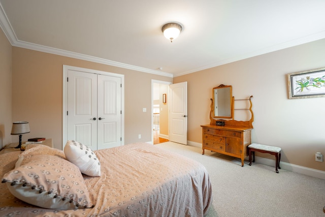 bedroom featuring light colored carpet, ornamental molding, and a closet