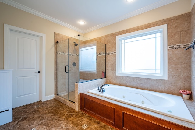 bathroom featuring crown molding and separate shower and tub