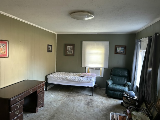 bedroom featuring crown molding, light colored carpet, a textured ceiling, and cooling unit