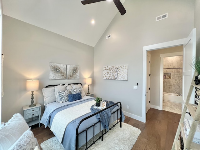 bedroom with baseboards, high vaulted ceiling, wood finished floors, and a ceiling fan