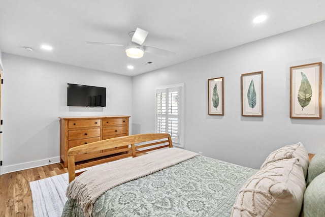 bedroom featuring wood-type flooring and ceiling fan