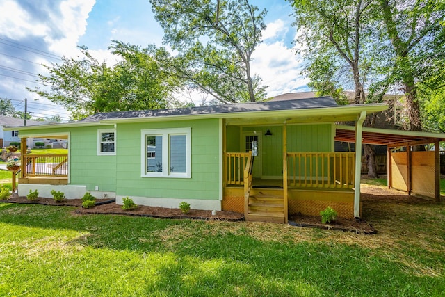 view of front of home with a front lawn and covered porch