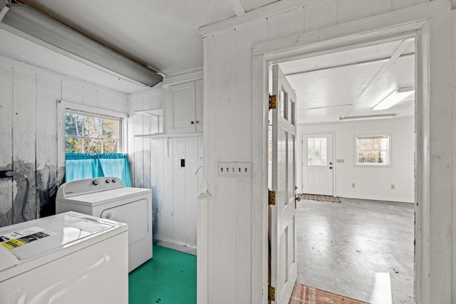 laundry room featuring washing machine and clothes dryer