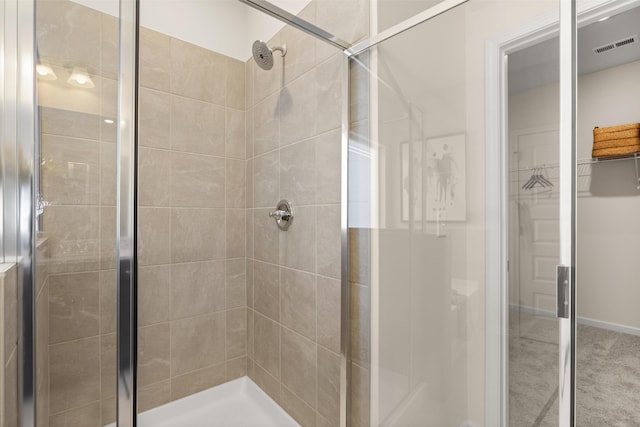 bathroom featuring walk in shower