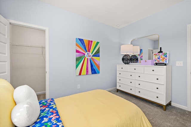 carpeted bedroom with a closet