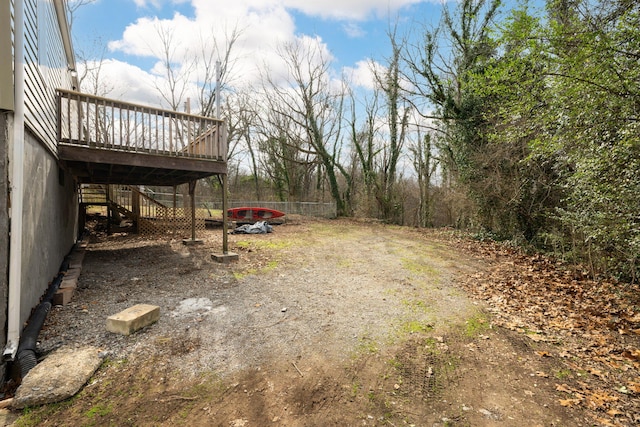 view of yard with a deck