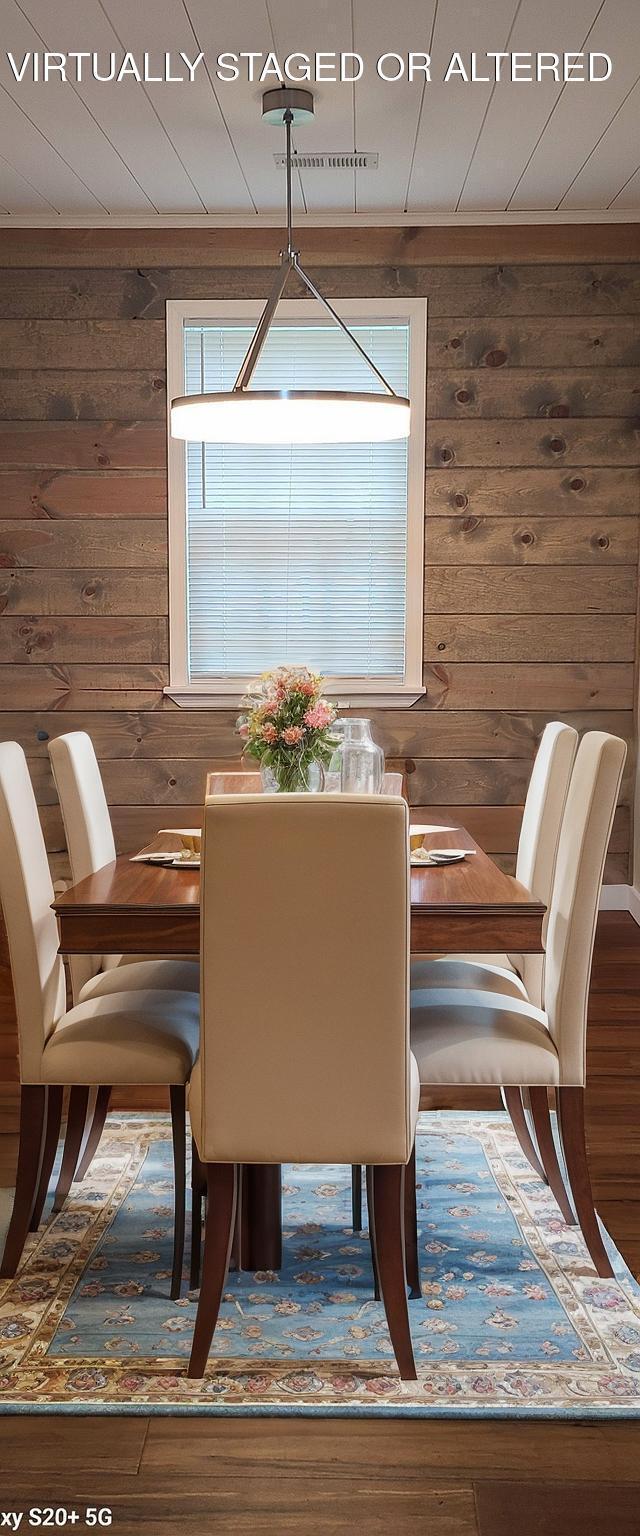 6442 Brookmead Cir, Hixson, TN 37343 - dining area featuring wood finished floors and wood walls