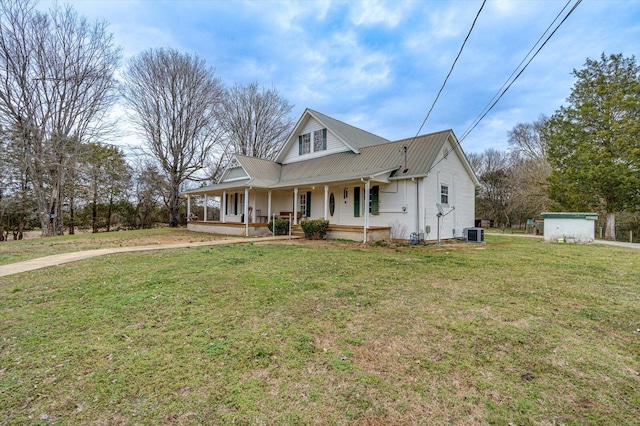 view of front of property featuring central AC, a front lawn, and a porch