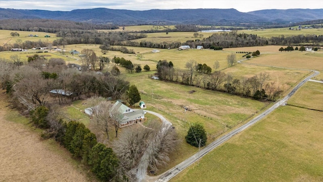 aerial view featuring a rural view and a mountain view