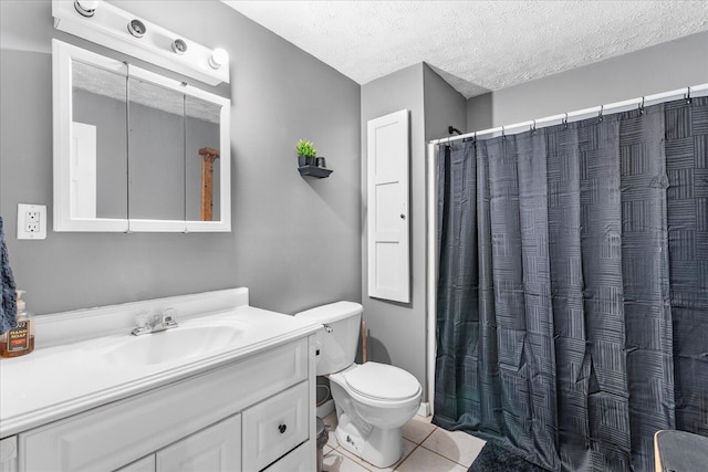 bathroom with vanity, a textured ceiling, curtained shower, tile patterned floors, and toilet