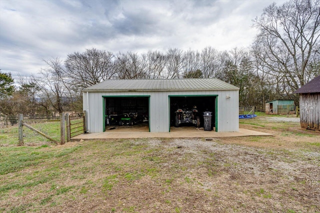 garage with a lawn