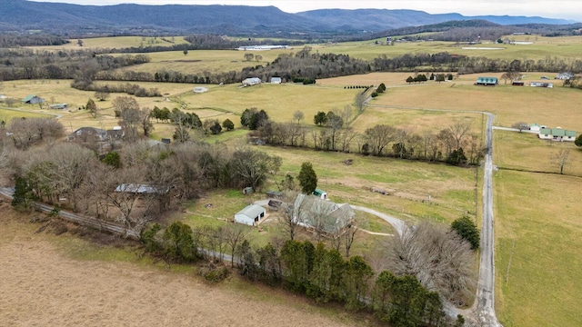 aerial view featuring a mountain view and a rural view