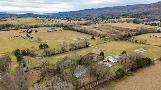 bird's eye view with a rural view and a mountain view