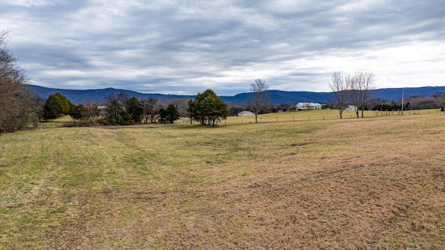 view of mountain feature with a rural view