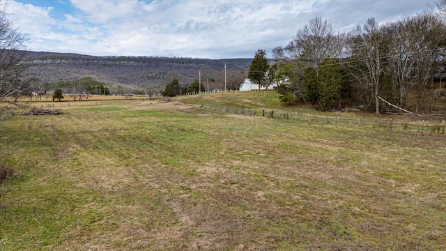 property view of mountains featuring a rural view