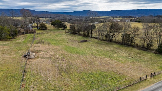 aerial view with a mountain view and a rural view