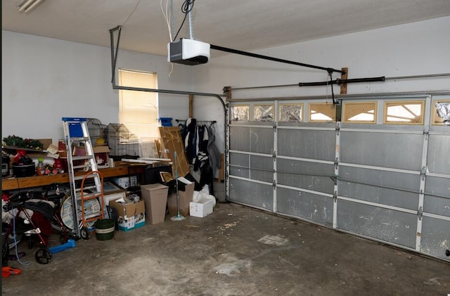 garage featuring a garage door opener