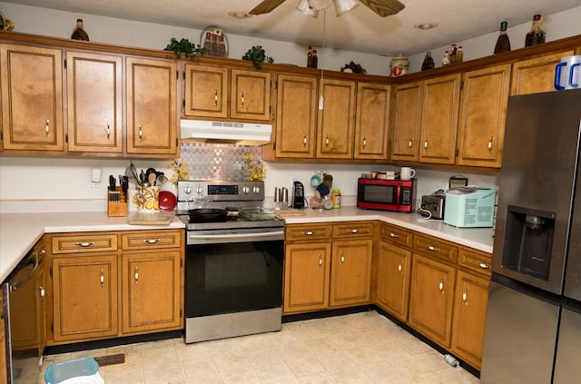 kitchen with decorative backsplash, stainless steel appliances, and ceiling fan