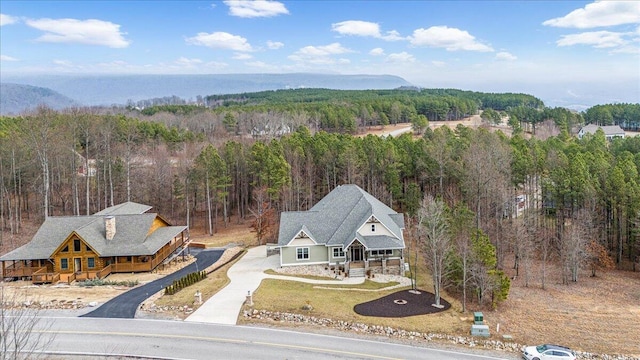 drone / aerial view with a forest view