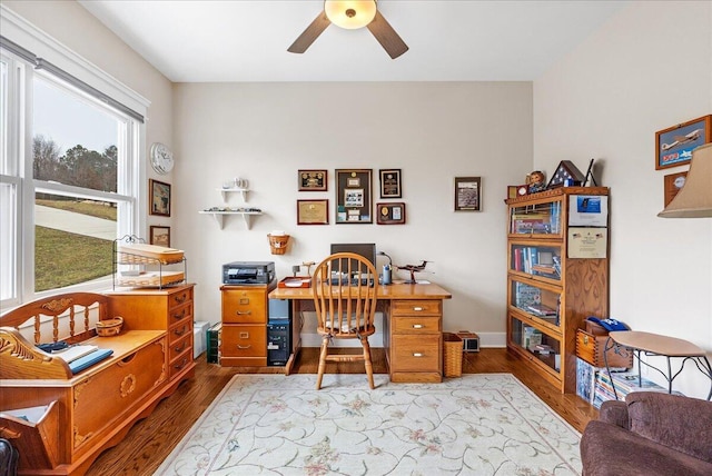 home office featuring ceiling fan and wood finished floors