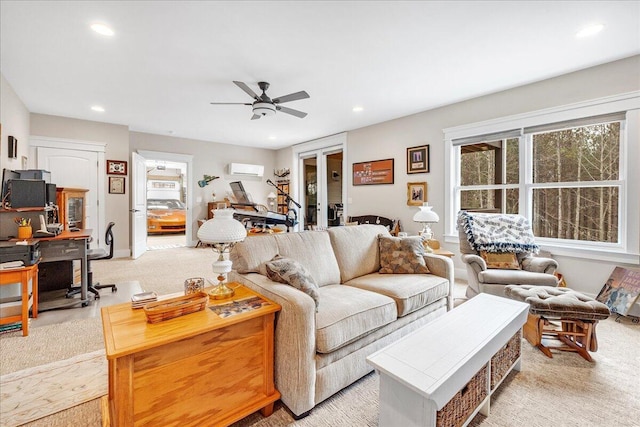 living room with recessed lighting, light carpet, a ceiling fan, french doors, and a wall mounted air conditioner