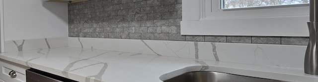 details with light stone countertops