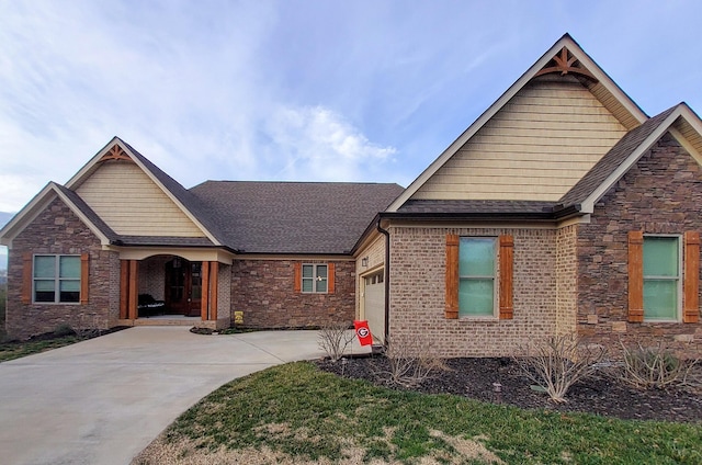 craftsman-style home with a garage