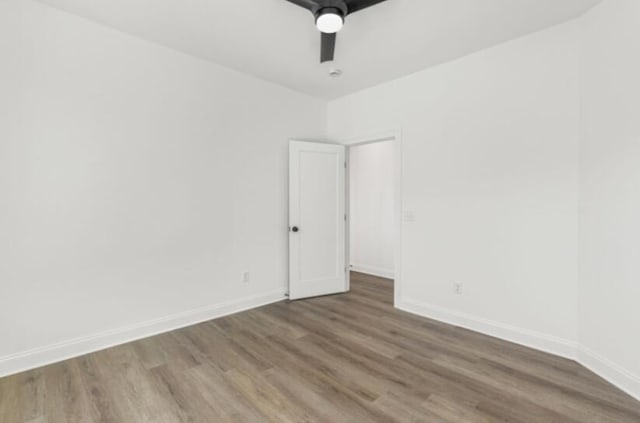 empty room featuring hardwood / wood-style flooring