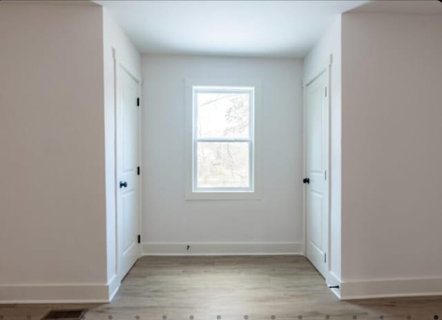 interior space with light hardwood / wood-style floors