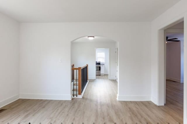 spare room with light wood-type flooring