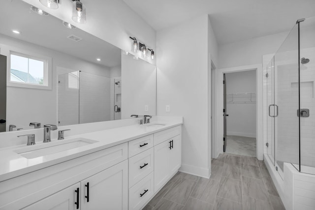 bathroom featuring vanity and walk in shower