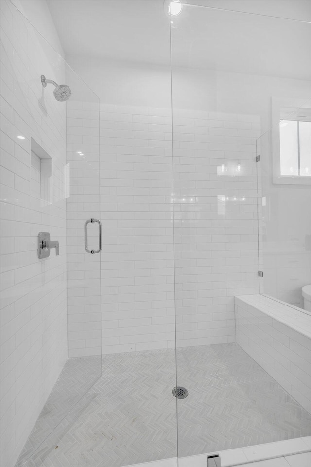 bathroom with an enclosed shower