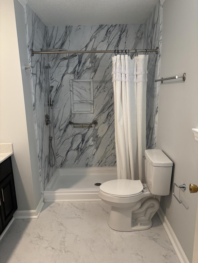 bathroom featuring vanity, toilet, a textured ceiling, and walk in shower